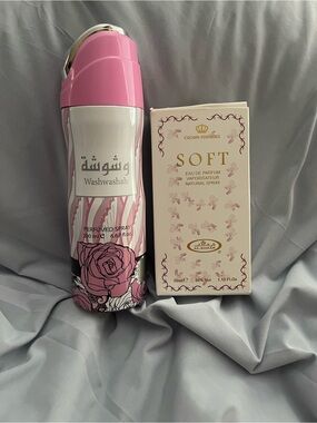 Pink Perfumed Body Spray and bottle of perfume